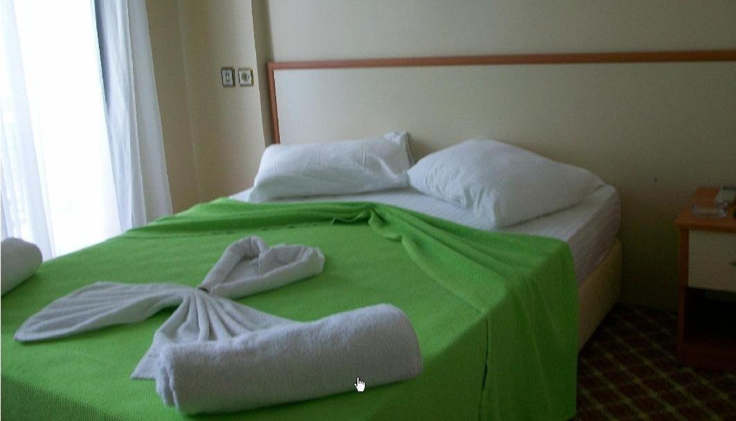 Kerman Hotel Çeşme Habitación foto